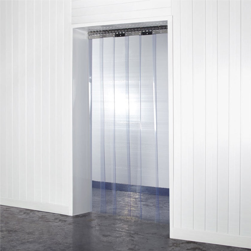 Example of Made to Measure Standard Grade PVC Strip Curtain in a warehouse setting, showcasing its clarity and fit