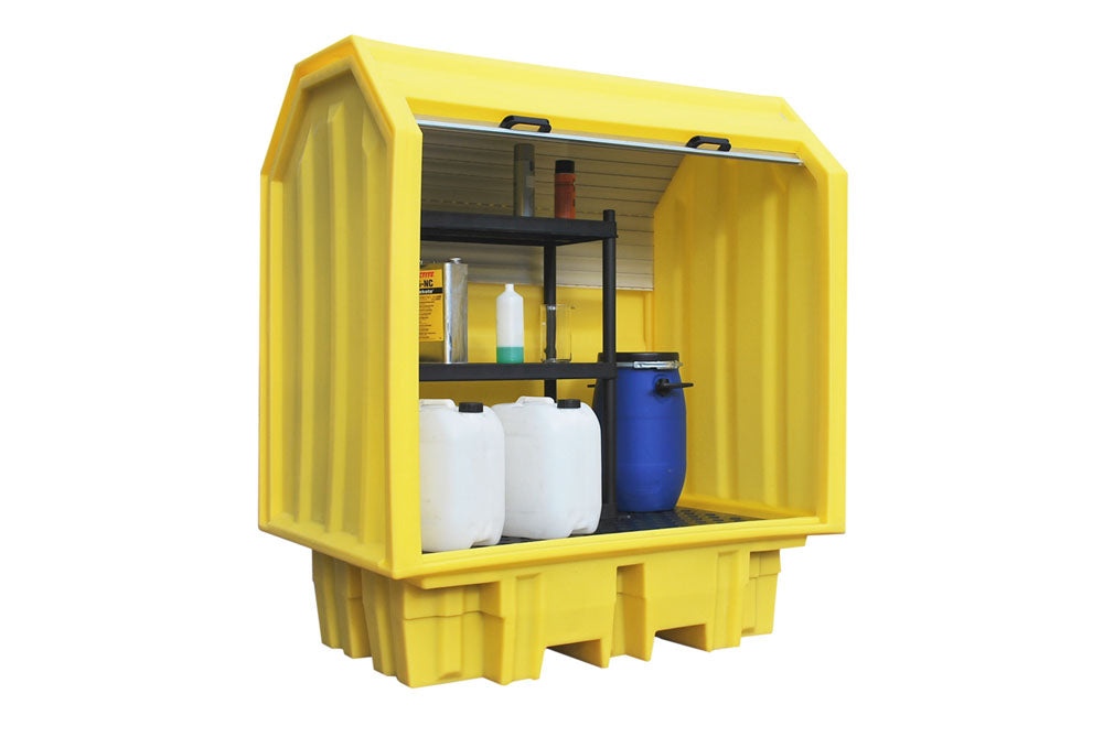 Yellow polyethylene vault with roller shutter doors open, storing two chemical drums inside.